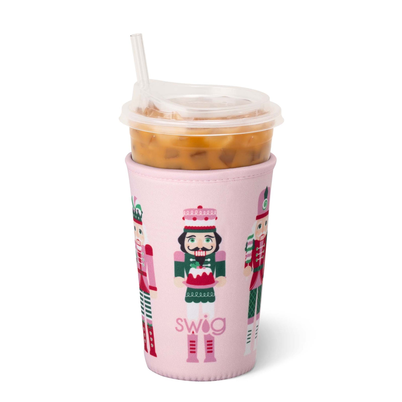 Pink 'swig' cup holder with Nutcracker design holding a drink on a white background