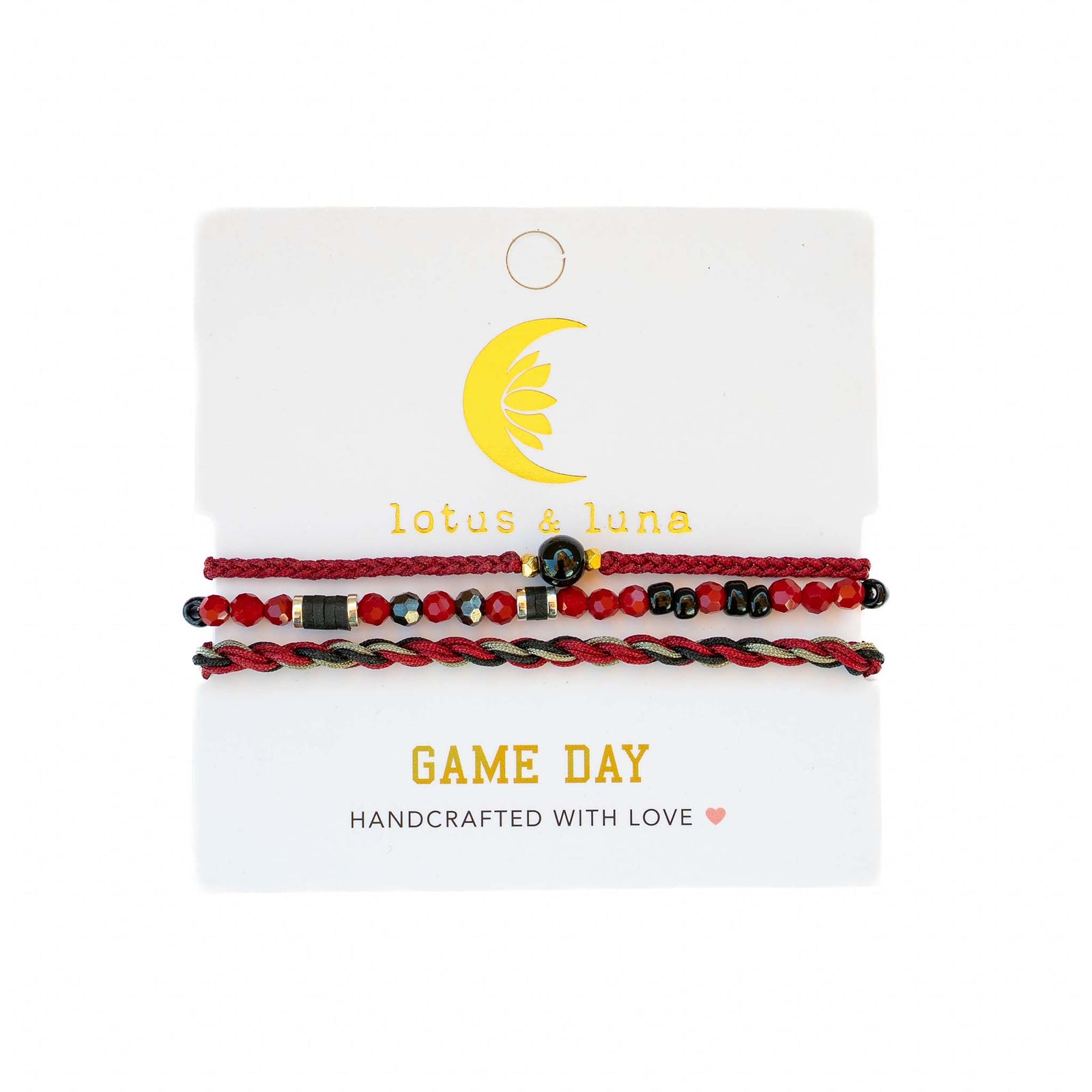 Lotus & Luna bracelet set in maroon, black, and gold with beaded and twisted bands, displayed on a Game Day card.