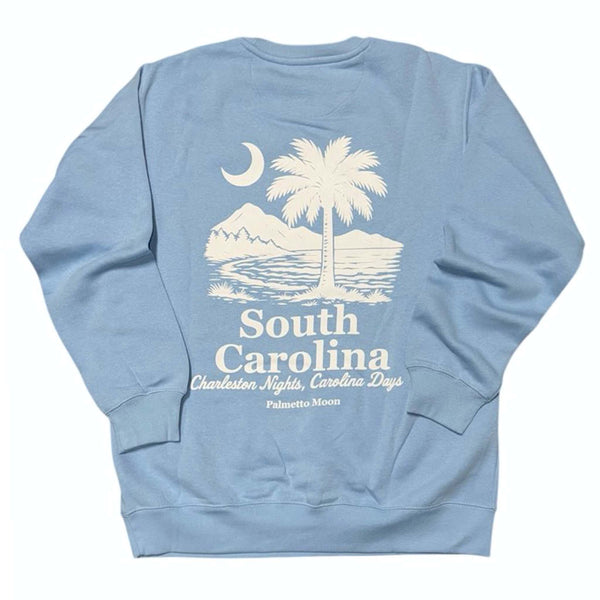  Light blue sweatshirt with a palm tree and mountain graphic on the back, featuring the text 'South Carolina'.