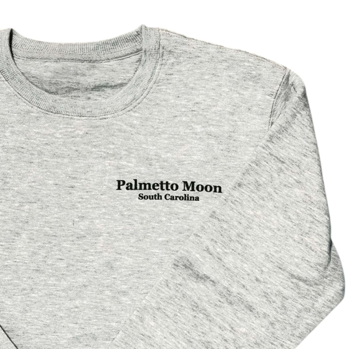 Heather Grey | Heather Light Grey sweatshirt with 'Palmetto Moon South Carolina' text on a white background
