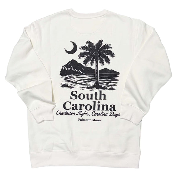  Ivory sweatshirt with black graphic design on the back featuring a palm tree, mountains, and text.