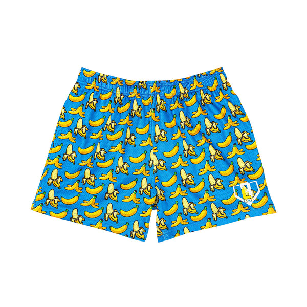 Front view of blue shorts covered in a repeating yellow banana and banana peel print, with a white Baseball Lifestyle logo on the left leg.