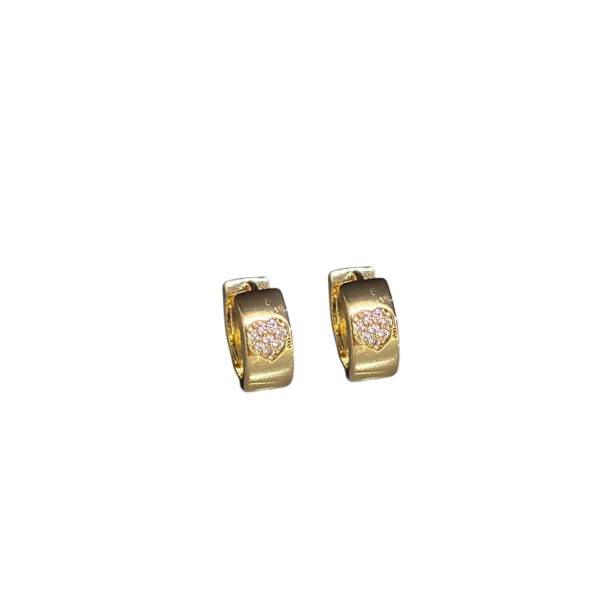 Pair of gold-dipped huggie earrings with cubic zirconia hearts, front view on white background.