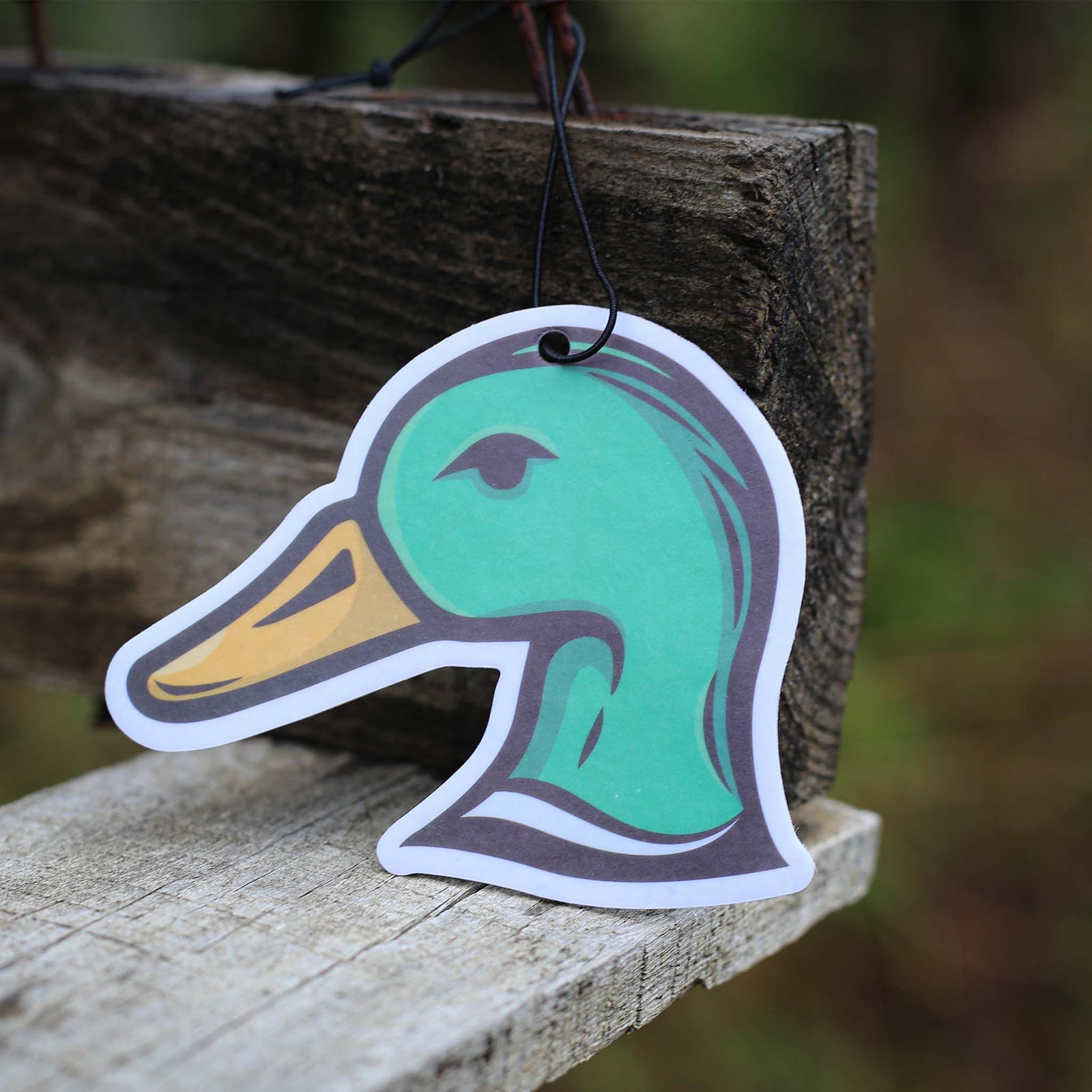Scent South Duck Head Air Freshener. Black Ice Scent.
The air freshener is a graphic of a green mallard head with a string, ready to hang in your favorite place!