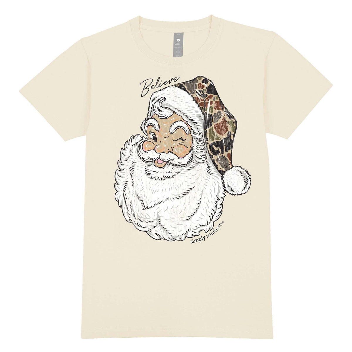 Beige t-shirt with a graphic of a Santa Claus face and 'Believe' text on a white background