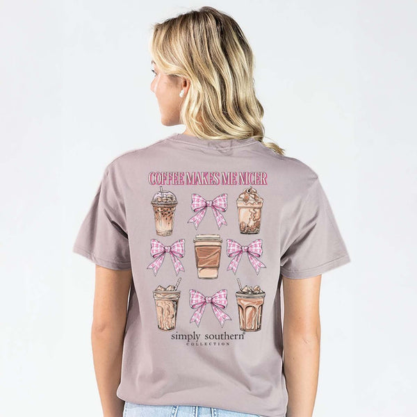 Woman wearing a gray t-shirt with coffee-themed graphics and 'Simply Southern' text.