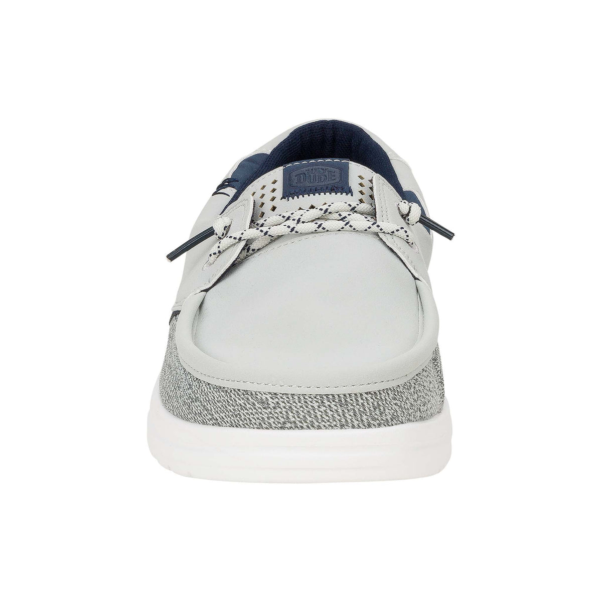 White boat shoe with gray sole and blue accents on a white background
