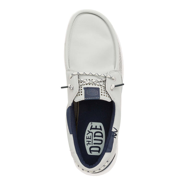 White shoe with 'Hey Dude' logo on a white background