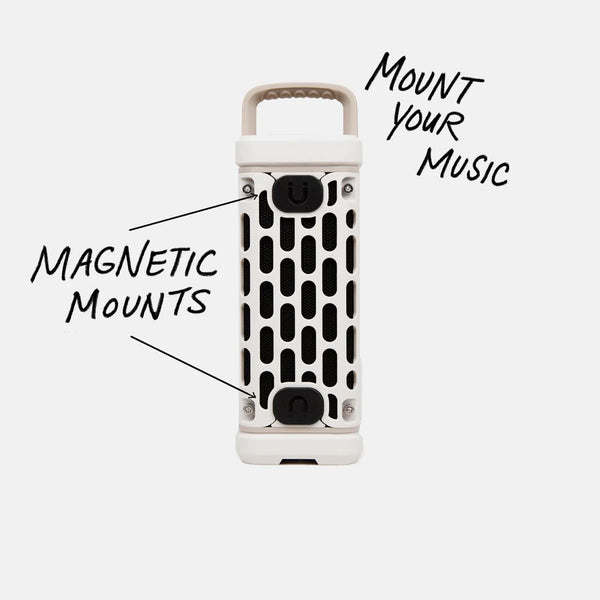 Side view of the speaker with black mesh and "TURTLEBOX" branding. Arrows label magnetic mounts and the phrase "Mount Your Music."