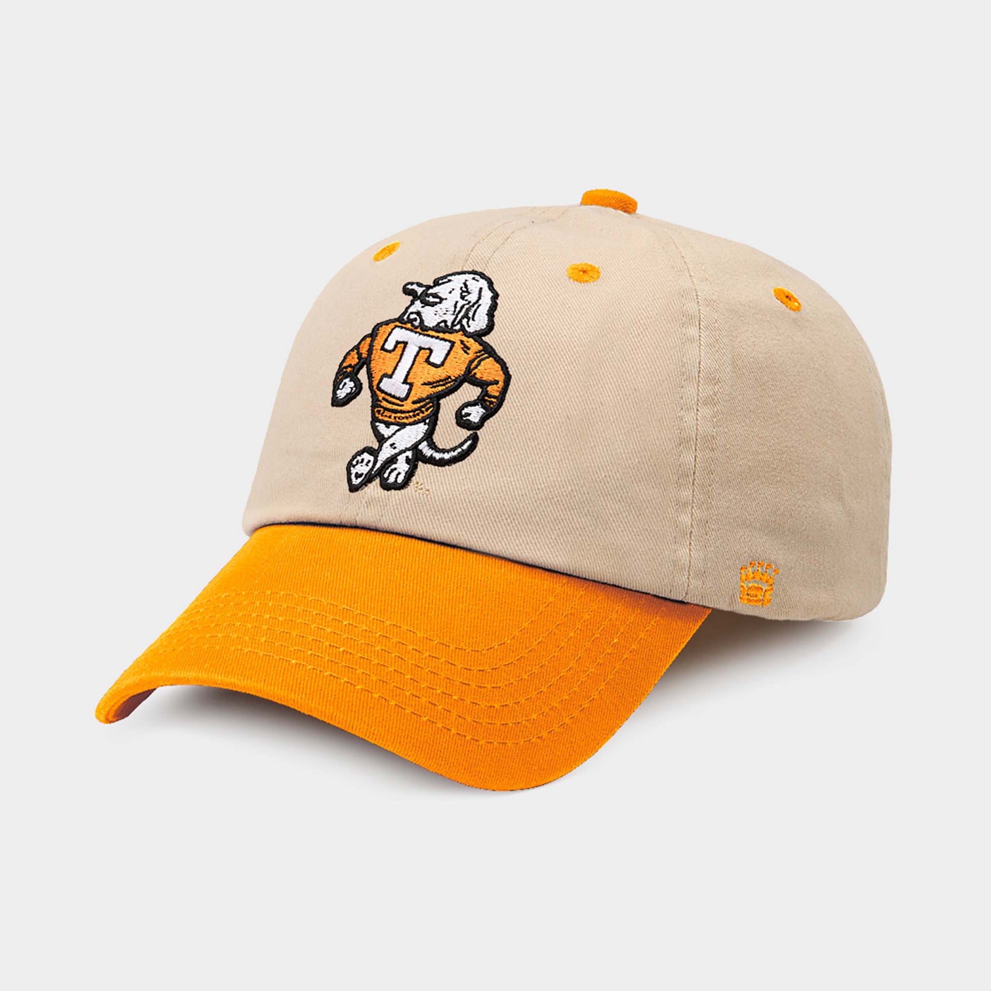 Tennessee Volunteers two-tone dad hat with natural crown, orange bill, and embroidered Smokey mascot on front.