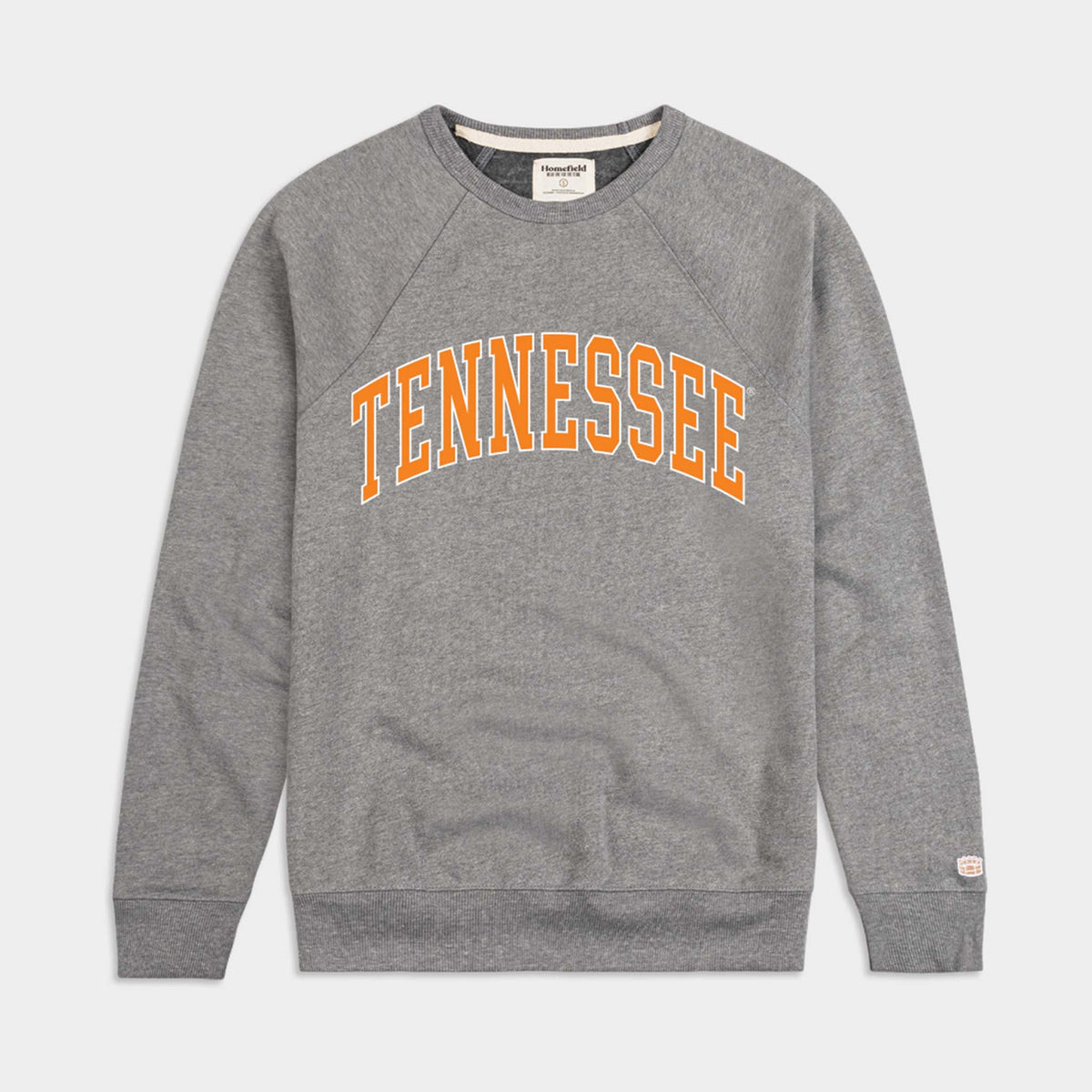 Light grey Tennessee crewneck sweatshirt with bold orange lettering across chest.
