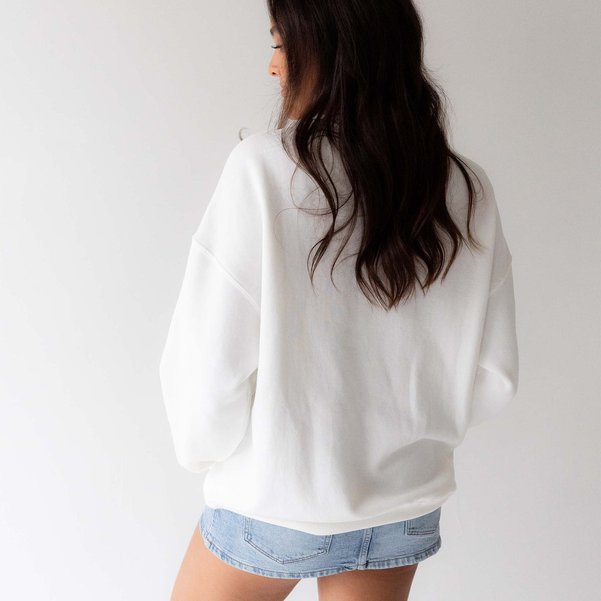 Back view of plain white Tennessee Volunteers sweatshirt with relaxed fit.