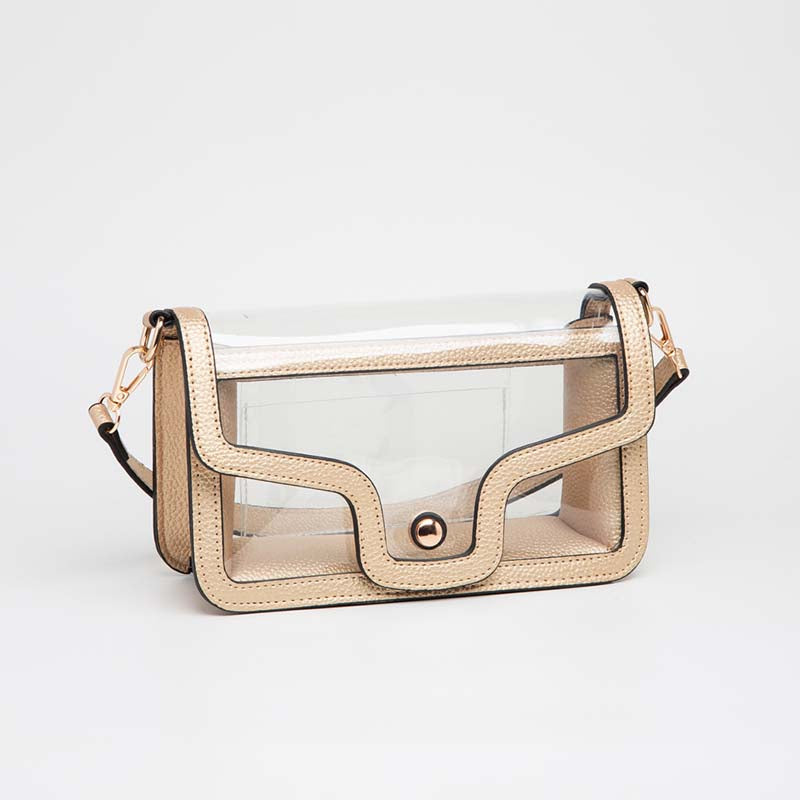 A gold-colored shoulder bag with a clear flap, suitable for carrying essentials.