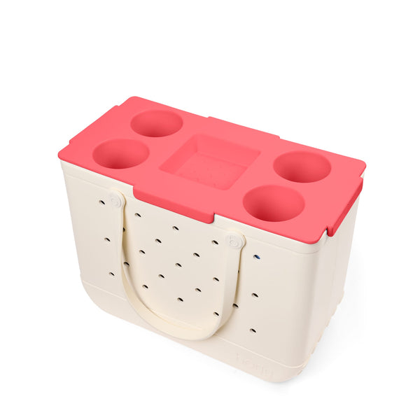 Top O' The Bogg To Ya Bogg Bag Tray Insert in Capri Coral shown in use on a beige Bogg Bag 