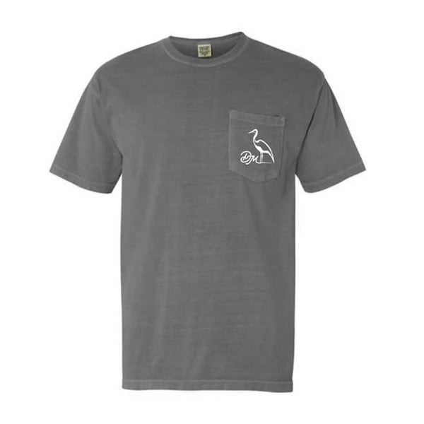 Dirty Marsh Outfitters Tour Tee Short Sleeve T-Shirt, sizes S-XXL, 100% cotton. Front view of a grey Dirty Marsh t-shirt with a white heron logo and “DM” initials on the pocket.