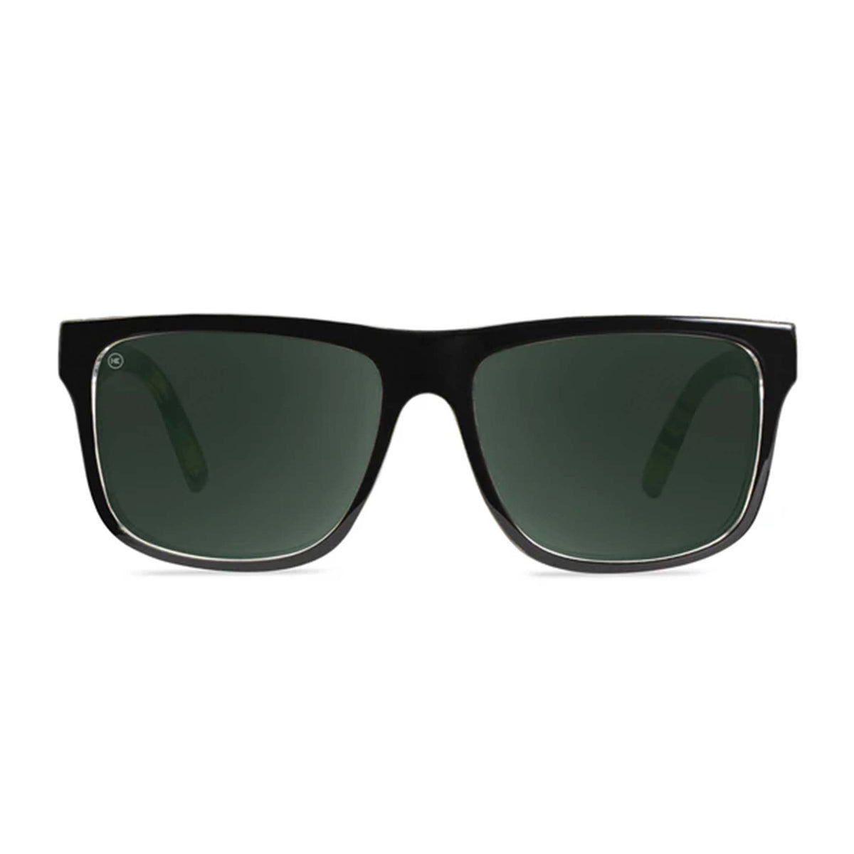 Black sunglasses with dark lenses on a white background