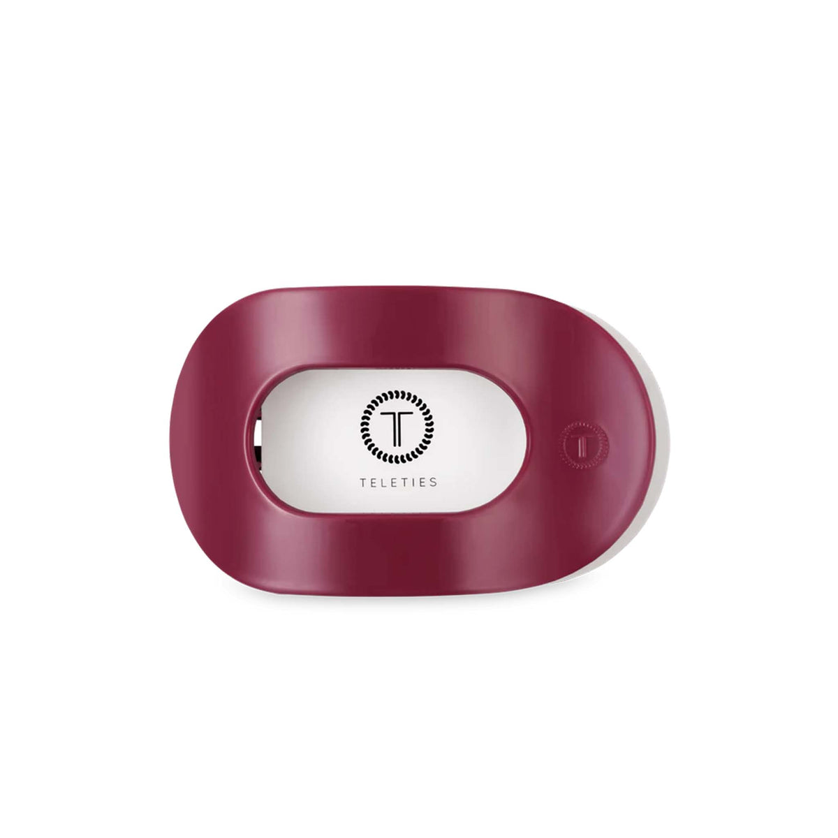 Teleties Flat Oval Clip in Wildside shown from the top with branded insert inside the oval opening.