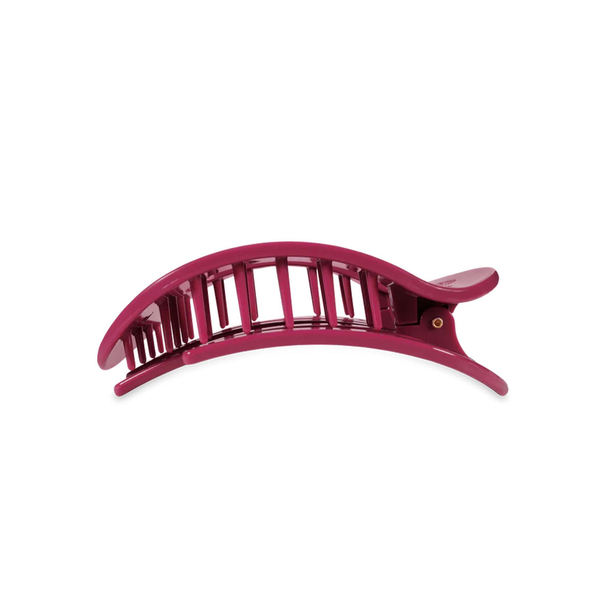 Side profile of Teleties Flat Oval Clip in Wildside showing curved grip teeth and slim design.