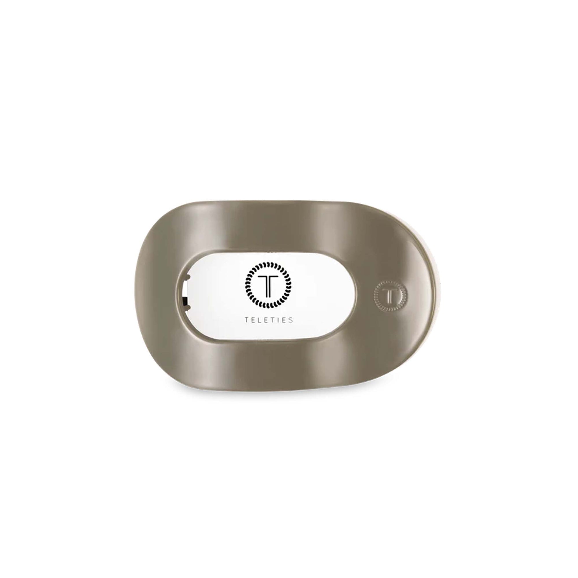 Teleties medium flat oval hair clip in Sage It Ain’t So, shown from the front with Teleties logo packaging insert.