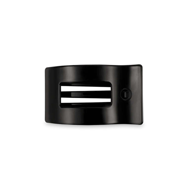 Flat lay of Medium Flat Rectangle Hair Clip in Jet Black with rectangular cutout.