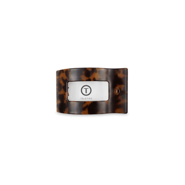 Small Flat Rectangle Hair Clip in Tortoise front view with packaging insert on white background.