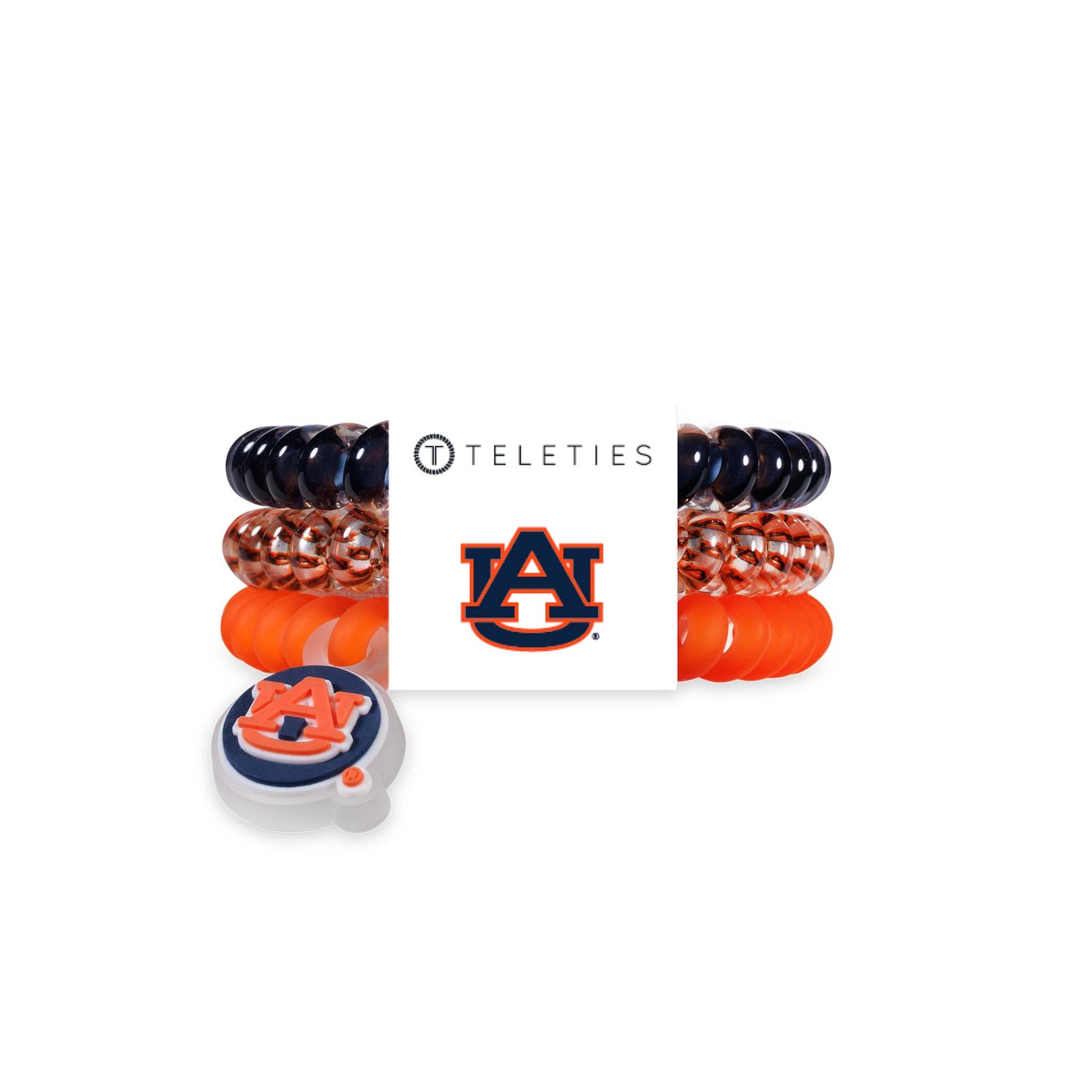 Auburn University Teleties hair tie set of three in orange, patterned clear, and navy, displayed in packaging with Auburn logo.