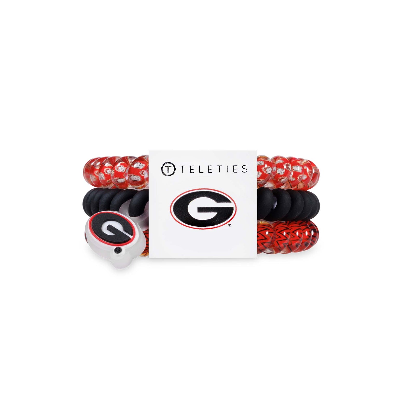 Georgia Bulldogs Teleties three-pack featuring spiral hair ties in black and red patterns, displayed in packaging with Bulldogs “G” logo.