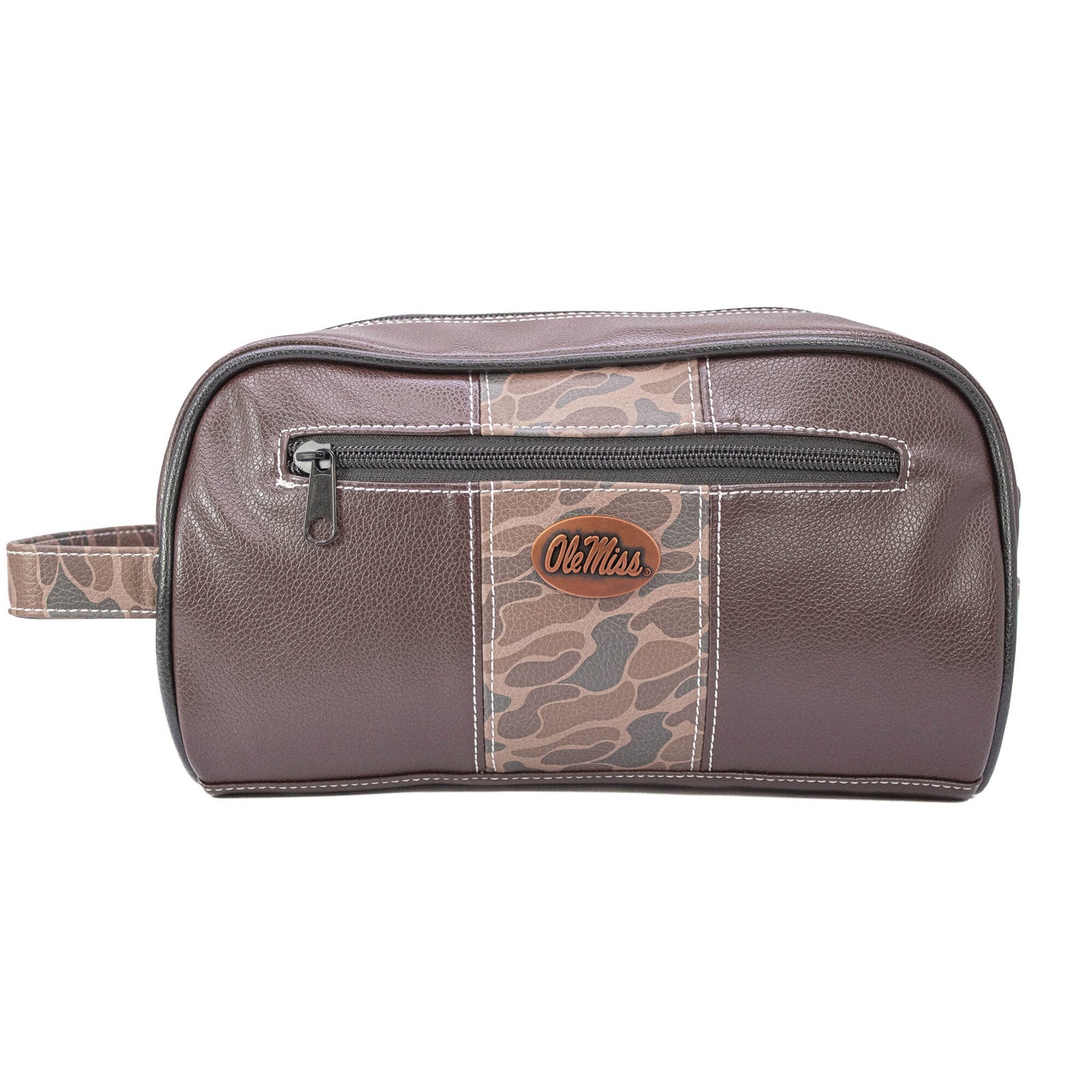 Leather dopp kit with a rich brown finish, featuring a silver concho-style Ole Miss emblem centered on the front. The bag is rectangular with a top zipper closure and a side leather handle, displayed against a plain, neutral background.