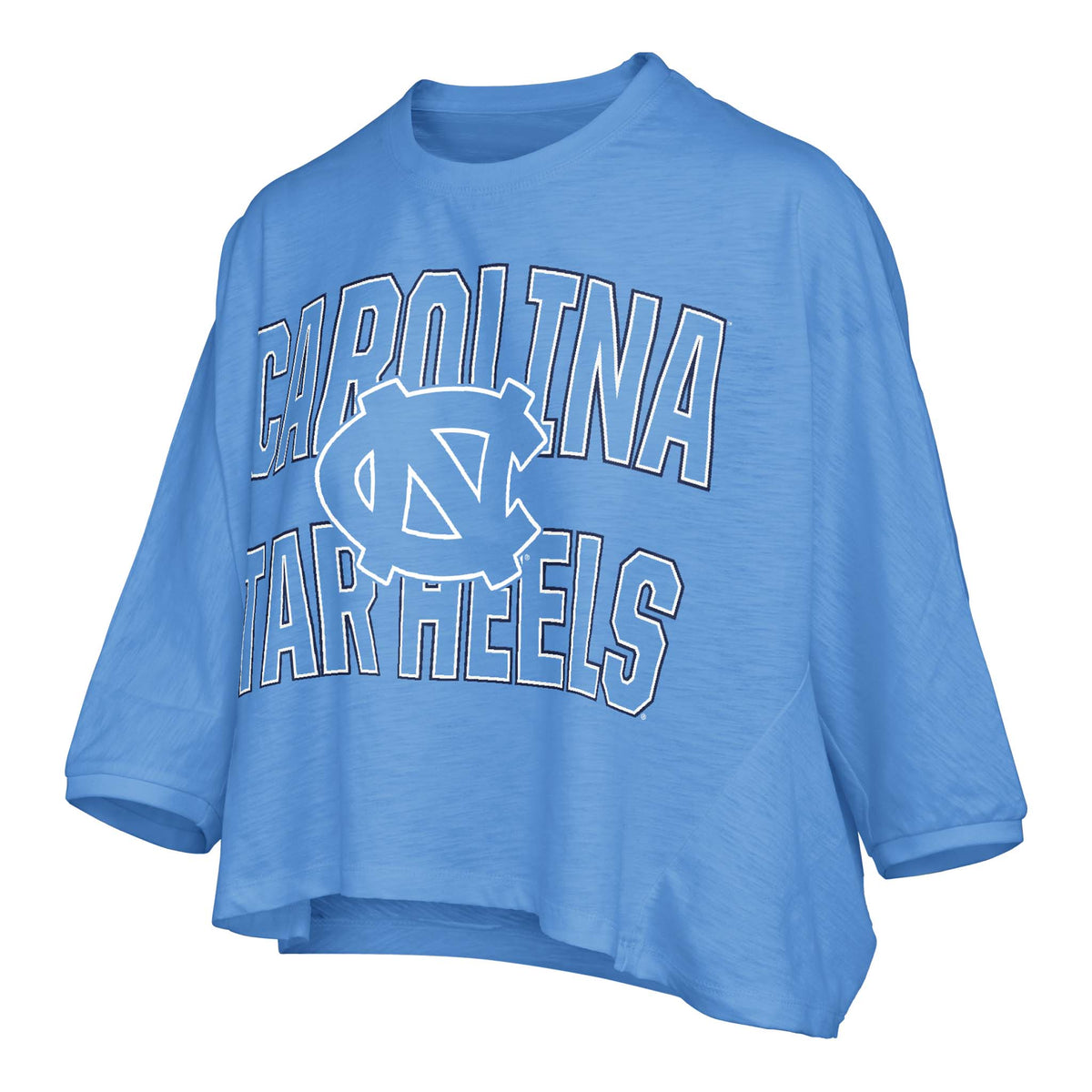 Cropped light blue University of North Carolina top with "Carolina Tar Heels" and interlocking NC logo on the front, featuring 3/4 sleeves and a high-low hem.