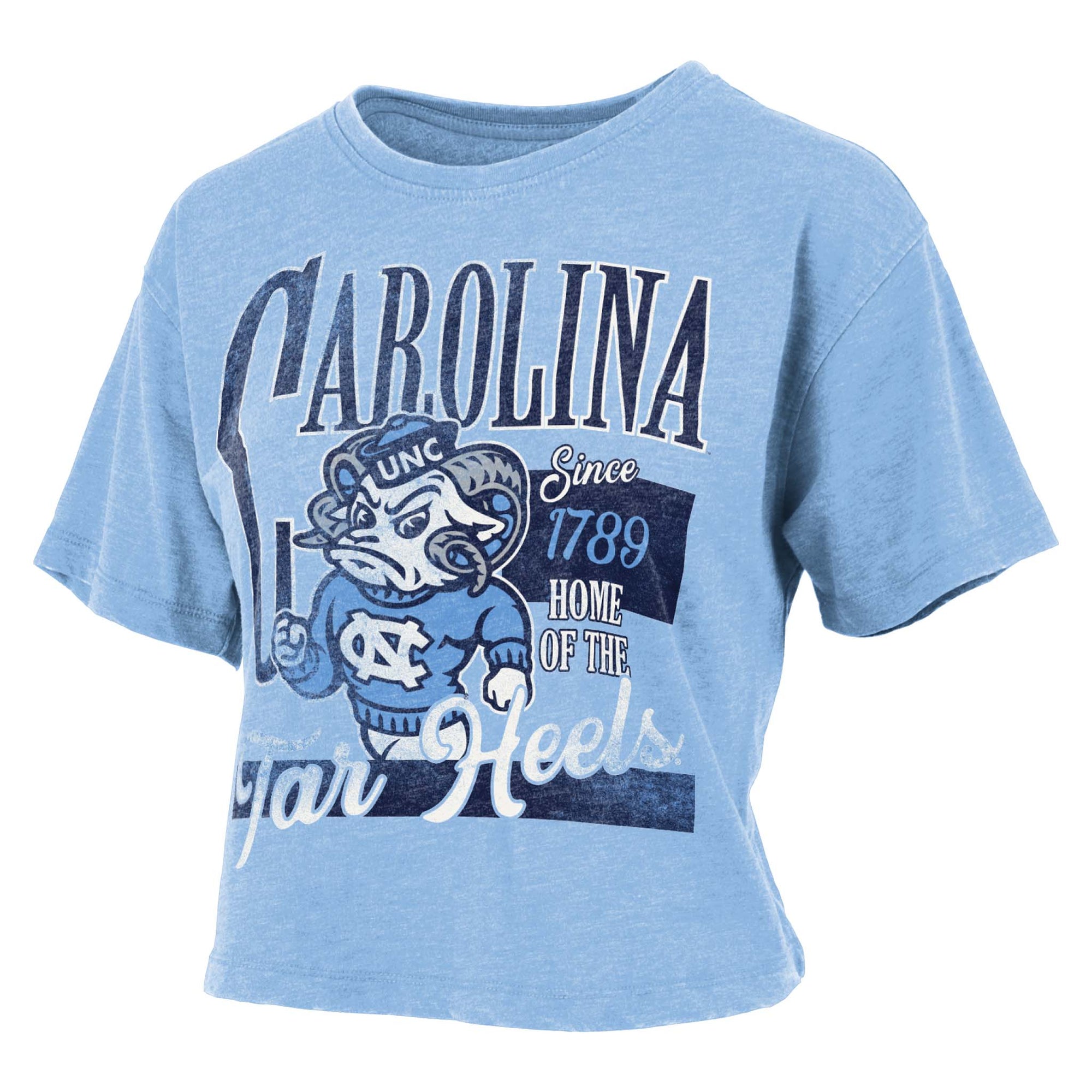 Light blue cropped UNC Tar Heels t-shirt with mascot graphic, oversized “Carolina” text, and “Since 1789 Home of the Tar Heels” design.