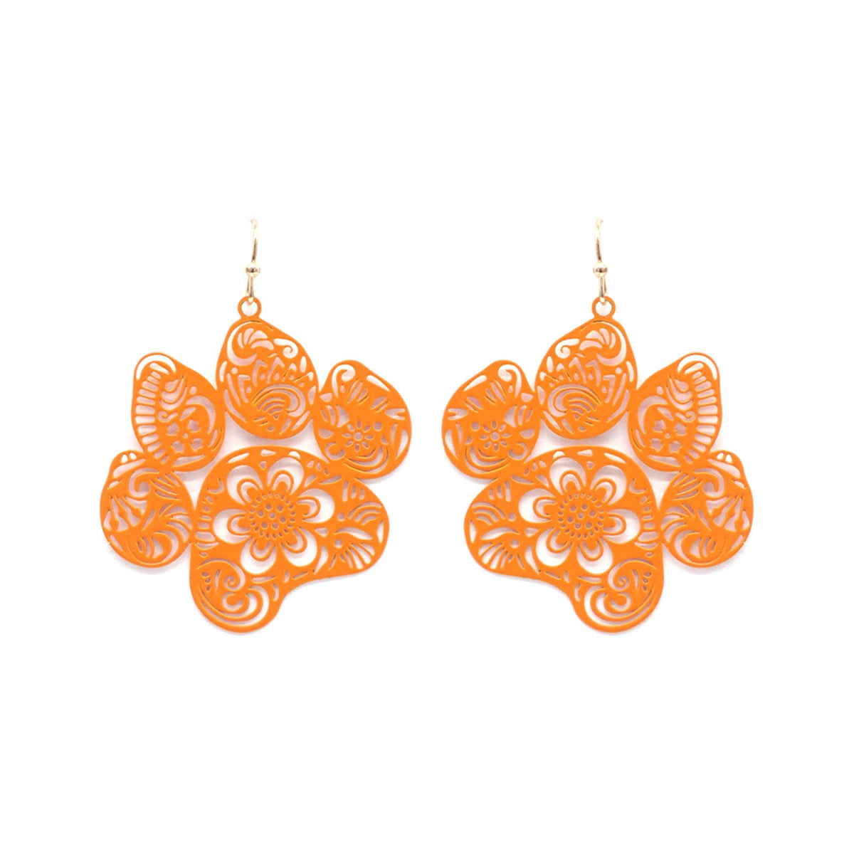 Orange dangle earrings shaped like a paw print with floral cutout detailing, set against a white background.