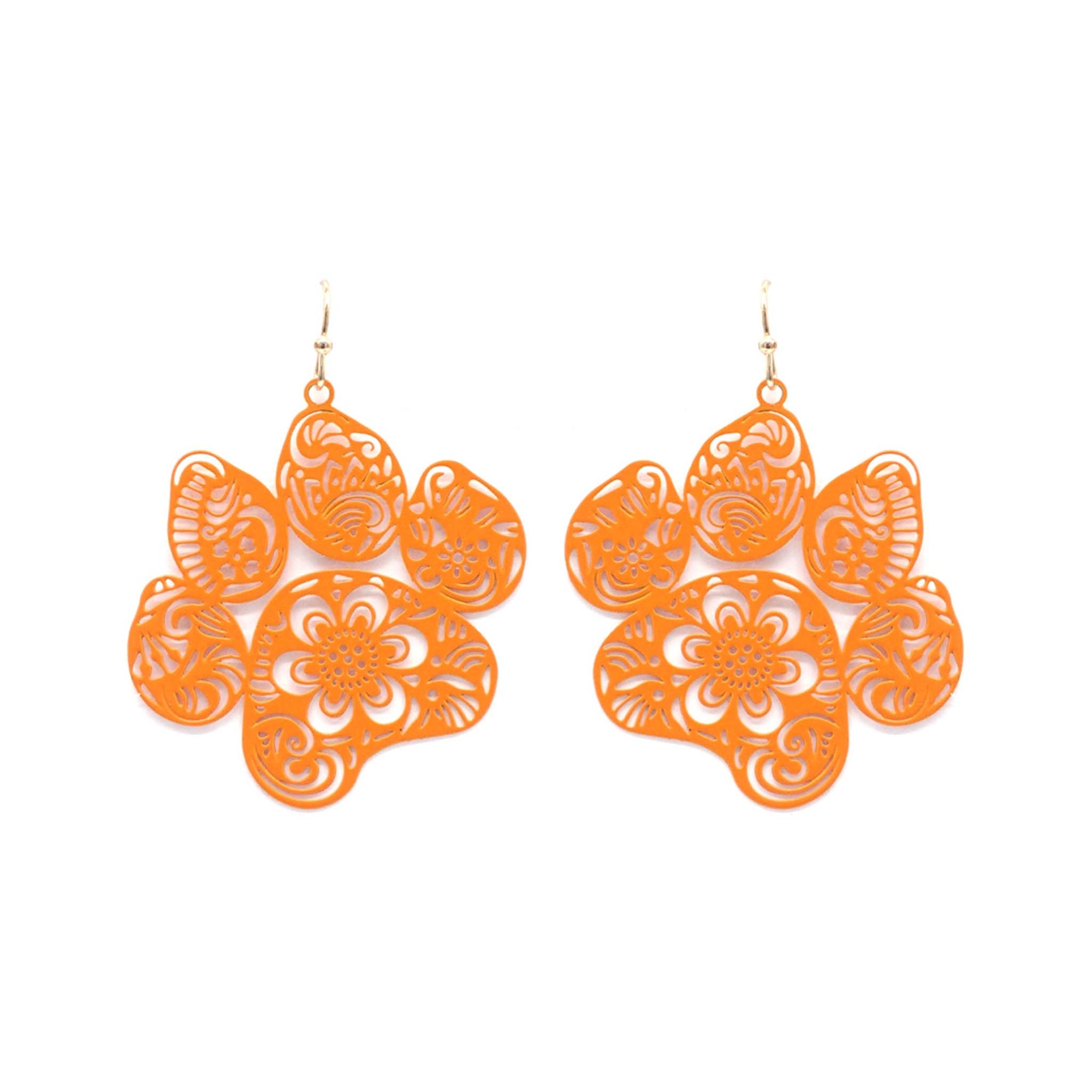 Orange dangle earrings shaped like a paw print with floral cutout detailing, set against a white background.