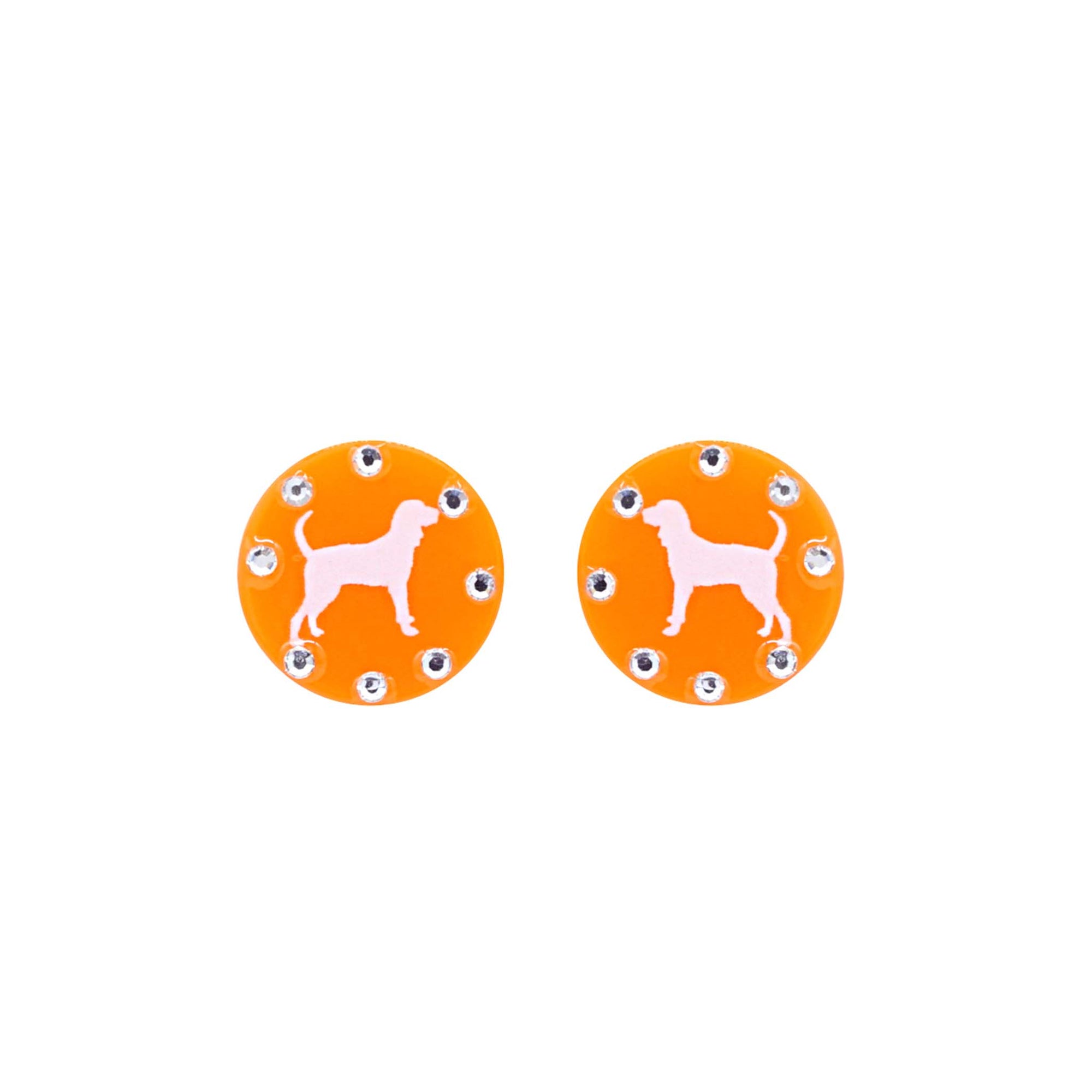 Orange round stud earrings featuring a white dog silhouette surrounded by clear crystal accents, shown on white background.