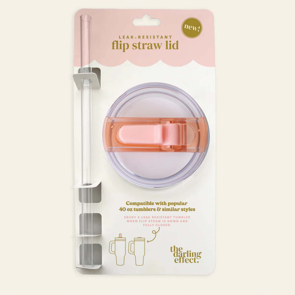 Leak-resistant flip straw lid in pink shown in retail packaging with included clear straw.
