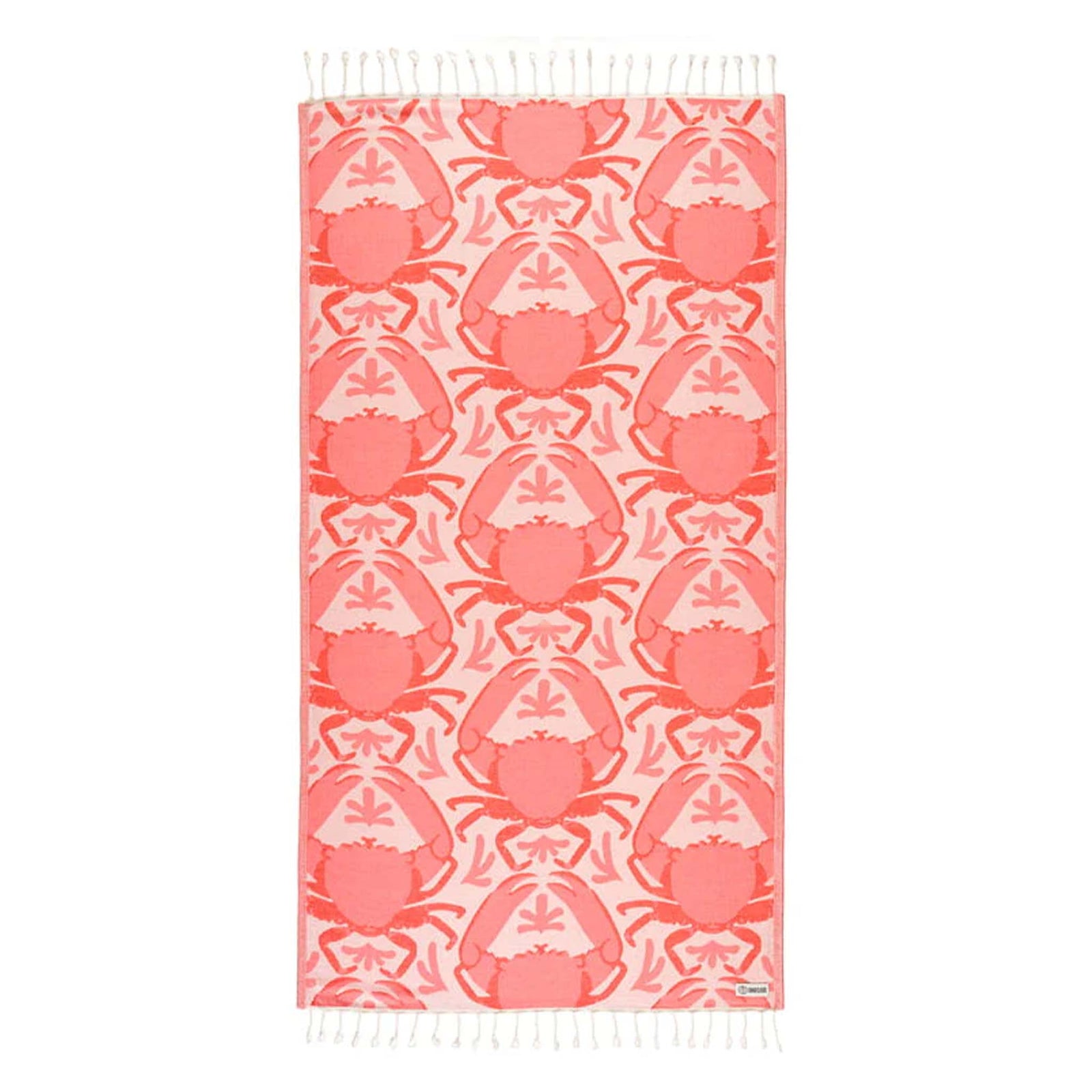 Sand Cloud Beach towel with peach crab pattern on a white background