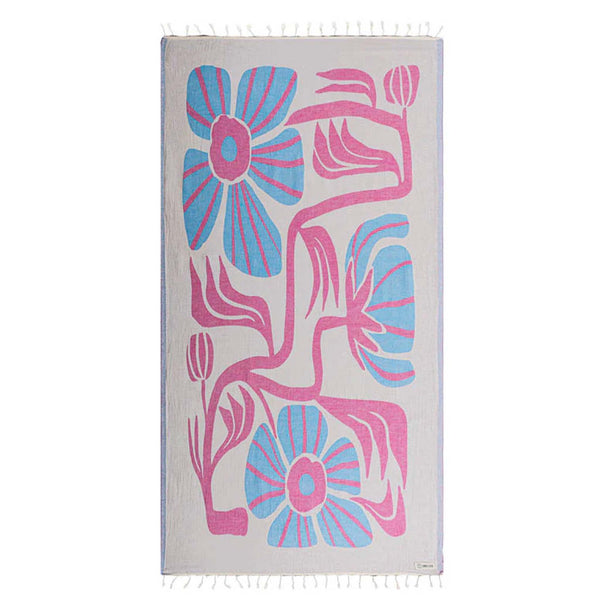 Sand Cloud Towel with pink and blue floral patterns on a white background