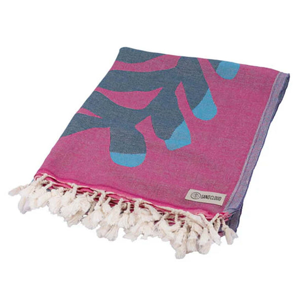 Large Fuchsia and Blue Kelp Swirl Sand Cloud Towel shown on a white background.