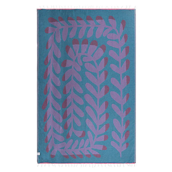 Large Fuchsia and Blue Kelp Swirl Sand Cloud Towel shown on a white background.