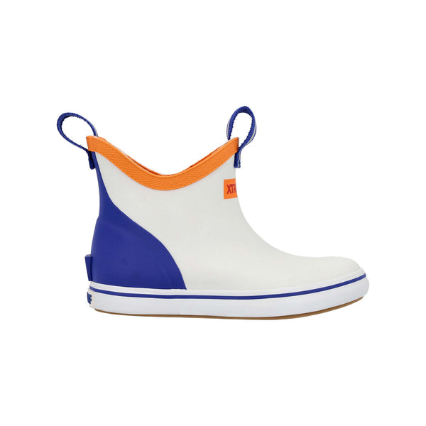 Side view of XTRATUF Youth Blue Ankle Deck Boot in White, highlighting the blue stretch-fit ankle, easy pull tab, and slip-resistant white outsole.