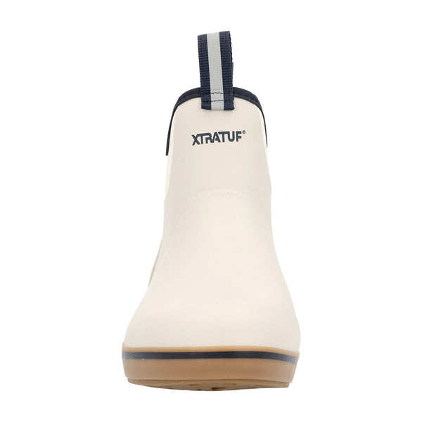 Front view of a men's 6-inch waterproof deck ankle boot in Ivory with Navy accents; shows rounded toe, reinforced rubber upper, and slip-resistant sole.