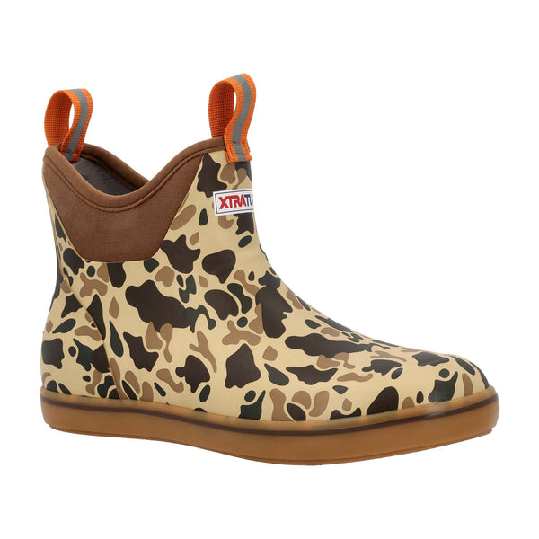 Camouflage-patterned boot with brown accents on a white background
