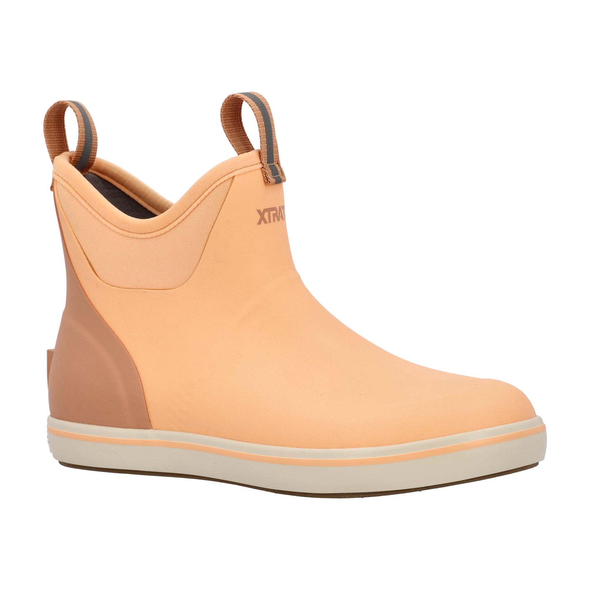 Peach slip-on boot with brown accents on a white background