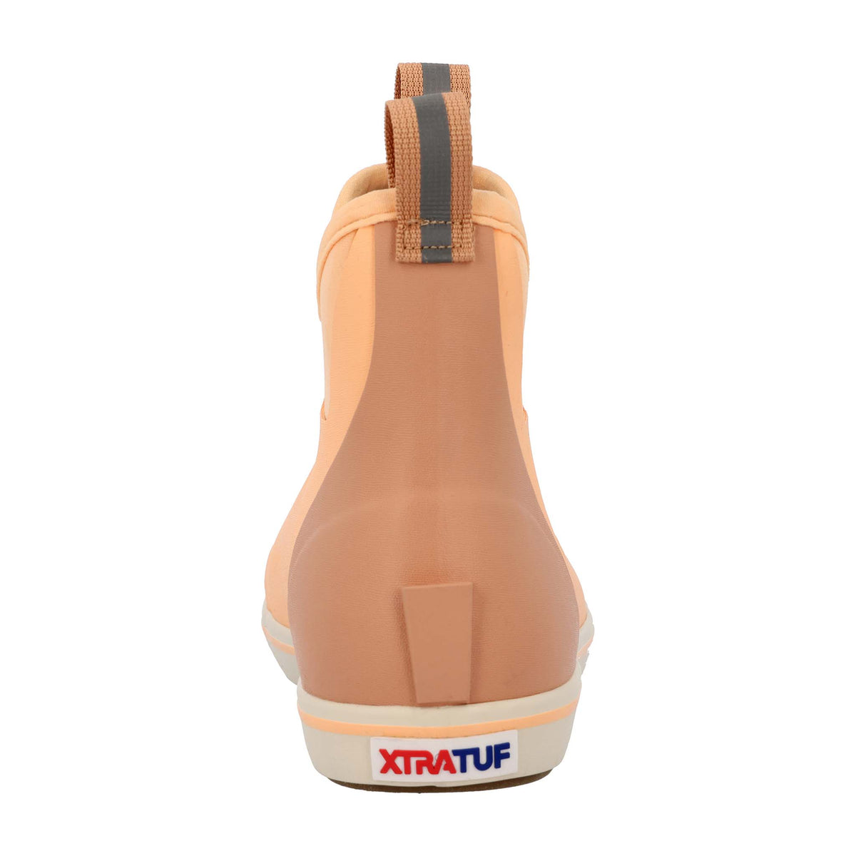 Peach slip-on boot with brown accents on a white background