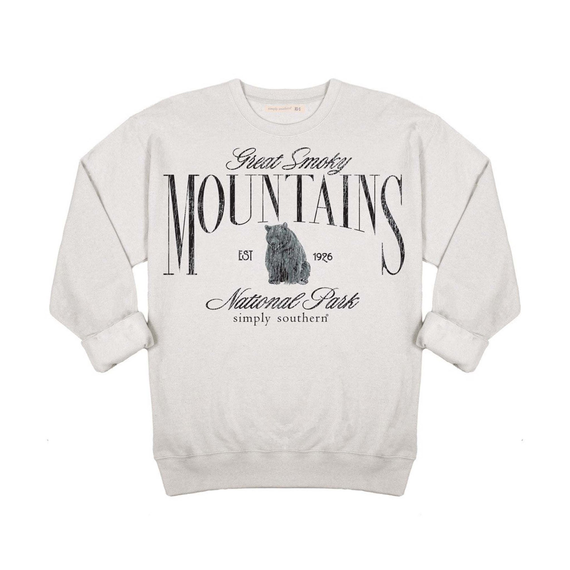 White sweatshirt with 'Great Smoky Mountains National Park' text and bear graphic on a white background