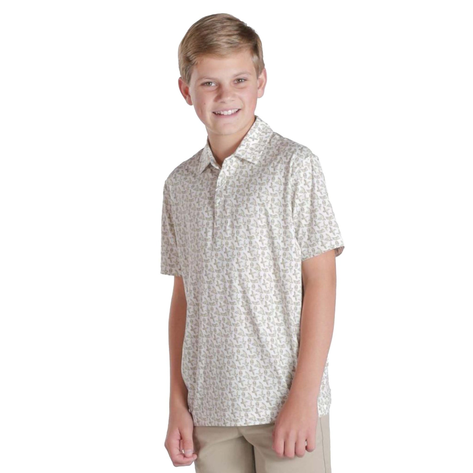 Young boy wearing a patterned polo on a white background