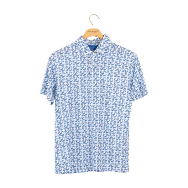 Short-sleeve polo on a hanger against a white background