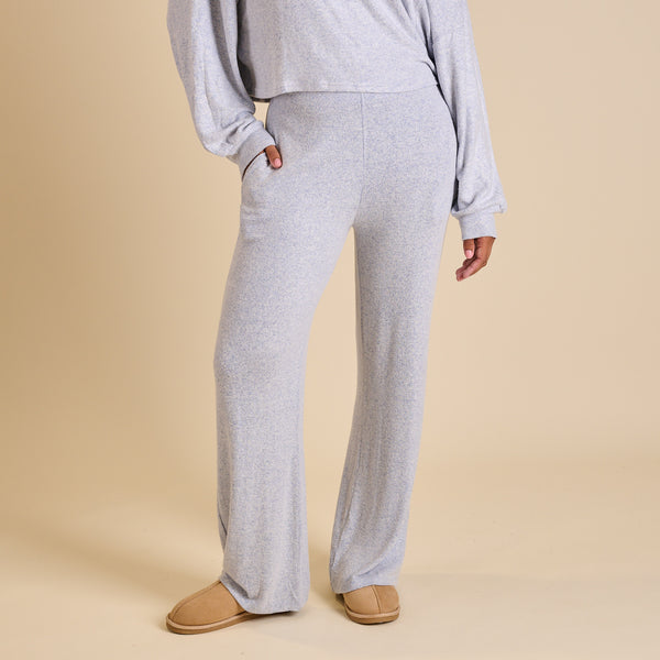 Woman wearing a blue lounge set.