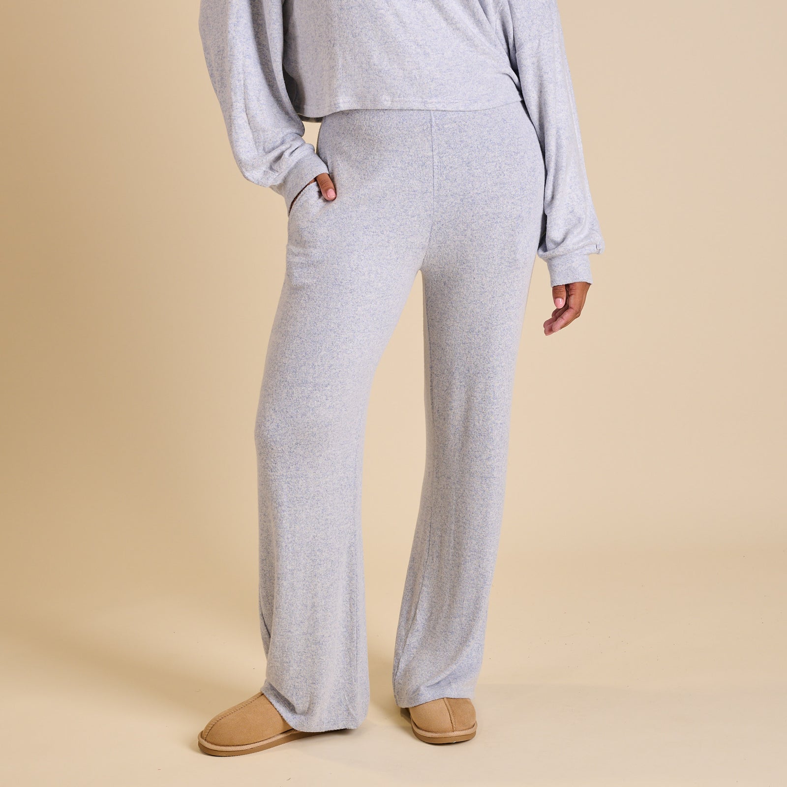 Woman wearing a blue lounge set.