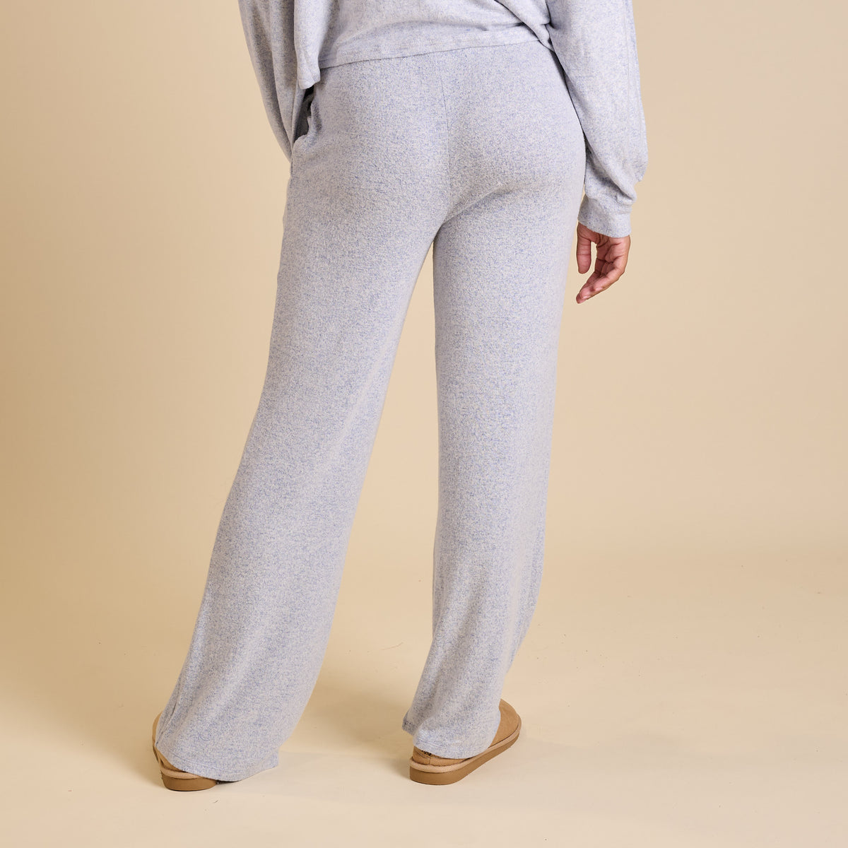 Woman wearing a blue lounge set.