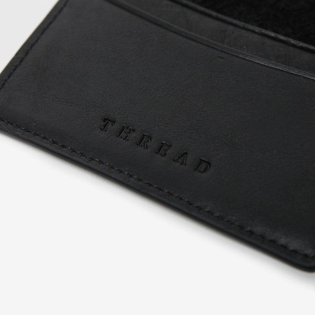 Carson Bifold Wallet close up on logo